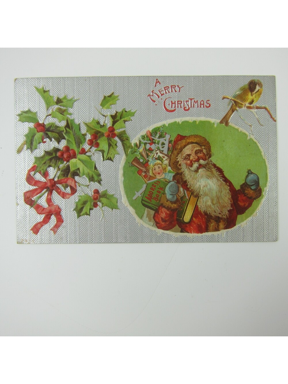 Antique Christmas Postcard Old World Santa Toys Holly & Bird Silver Embossed